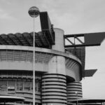 a black and white photo of a large building