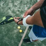 person holding tennis racket