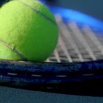 green tennis ball in closeup photography Tennis in carrozzina