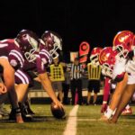 closeup photo of football players Football americano