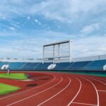 white and blue stadium under blue sky during daytime Gare di atletica 2025