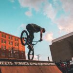 man riding bicycle on ramp