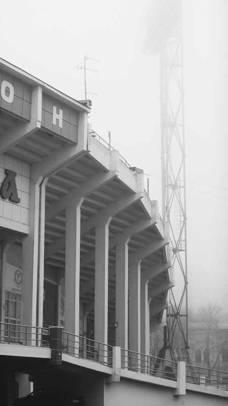a black and white photo of a baseball stadium