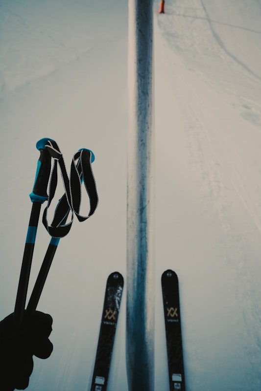 a pair of skis and poles in the snow