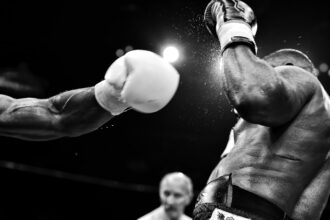 Left hook in a boxing match