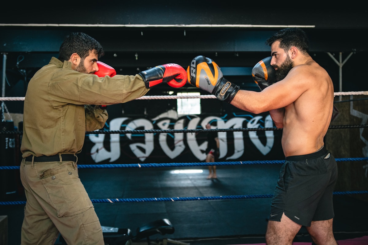 a man in a boxing ring with a punching glove