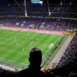 a soccer stadium filled with lots of people